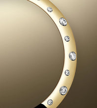 Load image into Gallery viewer, Datejust 31 is a gold and Oystersteel model