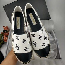 Load image into Gallery viewer, Chanel CC print flat
